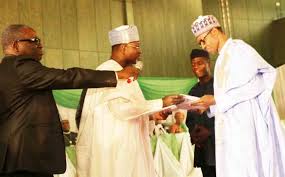 INEC Presents Certificate Of Return To Buhari