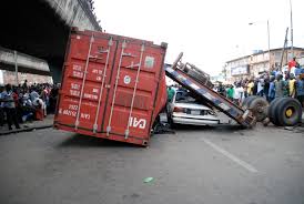 BREAKING: Another container falls off Ojuelegba bridge